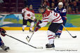 Canada's Haley Irwin shows close control of stick and puck during their match against Slovakia at the 2010 Winter Olympic Games in Vancouver.