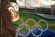 A First Nations Totem Pole looks across to the Olympic Rings displayed in the lobby of the Main Press Centre at the 2010 Winter Olympic Games in vancouver