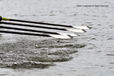 A generic image of a crew of four feathering their oars while stroking during a race at the 2010 Women's Henley Regatta on the River Thames.