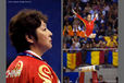 A seemingly inscrutable Chinese head coach watches her gymnast
 Deng Linlin, competing on the Balance Beam at the 2009 London World Artistic Gymnastics Championships at the 02 Arena.