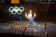 The Olympic flame and rings