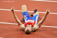 Alexey Labzin (Russia) celebrates winning the 100 metres T13 race during the Athletics competition of the London 2102 Paralympic Games.