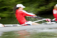 Blurred action of a woman rowing 