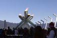 The Olympic Flame burns in the cauldron at the Waterfront in Vancouver protected by security fencing much to the frustration of residents and visitors.