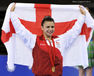 Claudia Fragapane (England) celebrates winning the gold medal in the all around at the Gymnastics competition of the 2014 Glasgow Commonwealth Games.