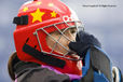 A cropped action portrait ofChina's goalkeeper Zhang Yimeng putting on her helmet before their match against Argentina at the 2010 Women's World Cup Hockey Tournament in Nottingham.