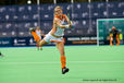 An action image of Lidewij Welten showing quick reactions and ball control as she goes on the attack during the England Versus Netherlands match at the 2010 Women's World Cup Hockey Tournament in Nottingham