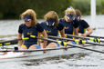 The J16 Coxless Four Crew of Nottingham Rowing Club are exhausted at the end of their race at the 2010 Women's Henley Regatta on the River Thames.