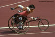 Wheelchair racer in full flight.
