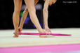 A cropped generic image of a gymnast competing with Hoop at the World Rhythmic Gymnastics Championships in Montpellier.