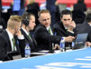 A group of judges in the men's artistic gymnastics competition at the 2014 Glasgow Commonwealth Games.