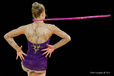 A cropped generic image of a gymnast competing with Hoop at the World Rhythmic Gymnastics Championships in Montpellier.