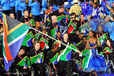 Oscar Pistorius (South Africa) carries the National flag during the team parade at the Opening Ceremony of the London 2012 Paralympic Games.