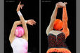 Generic images of gymnasts supporting the Ball on the front and back at the start of their routines at the World Rhythmic Gymnastics Championships in Montpellier.