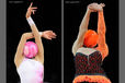 Generic images of gymnasts supporting the Ball on the front and back at the start of their routines at the World Rhythmic Gymnastics Championships in Montpellier.