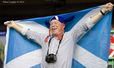 A Scottish supporter at the Opening Ceremony at the 2014 Glasgow Commonwealth Games .