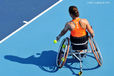 Marjolein Buis (Netherlands) bounces th ball before serving during her first round singles match in the women's wheelchair Tennis competition at the 2012 London Paralympic Games.