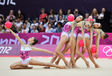 The group from Greece pose artistically at the start of their routine with five balls in the Rhythmic Gymnastics Competition at the London 2012 Olympic Games.