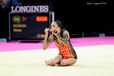 Neta Rivkin (israel) kisses her Clubs at the end of a successful routine at the World Rhythmic Gymnastics Championships in Montpellier