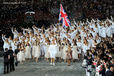 Sir Chris Hoy carries the Union flag and leads in the British team during the Opening Ceremony at the London 2012 Olympic Games.