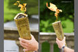 Local youth Ben Hope carries the Olympic Torch and Flame in the gardens of Chatsworth House in Derbyshire during the Torch Relay.