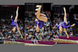 United States gymnasts Kyla Ross, Jordan Wieber and Alexandra Raismann competing on Balance Beam during the Artistic Gymnastics competition of the London 2012 Olympic Games.