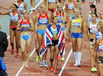 Surrounded by fellow heptathletes, Jessica Ennis (Great Britain) celebrates winning the gold medal at the 2012 London Olympic Games.