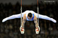 Kristian Thomas (Great Britain) competing on Rings at the 2012 FIG World Cup in the Emirates Arena