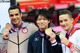 Kohei Uchimura (Japan) Danell Leyva (USA) and Marcel Nguyen (Germany) pose with their medals at the end of the all around team competition of the Gymnastics event at the 2012 London Olympic Games.