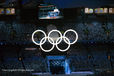 An image from the Opening Ceremony of the 2010 Winter Olympics in Vancouver with Olympic Rings featuring in the decoration of BC PLace and on the live view video screen.