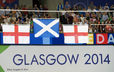 The flags of the medallists in the pommel horse final (Scotland gold, England silver and bronze) at the 2014 Glasgow Commonwealth Games.