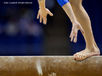 A generic image of the feet of a gymnast almost overbalancing while competing on the balance beam at the 2009 London World Artistic Gymnastics Championships at the 02 arena.