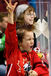 A young supporter cheers on the Canadian Women's Ice Hockey team during their match against Slovakia at the 2010 Winter Olympic Games in Vancouver.