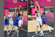 Defensive play by France fails to stop the Canadian attack during their women's Basketball match at the 2012 London Olympic Games.