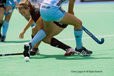 A cropped action image of Germany's Celine Wilde finding herself under pressure during their match against Argentina at the 2010 World Cup in Nottingham.